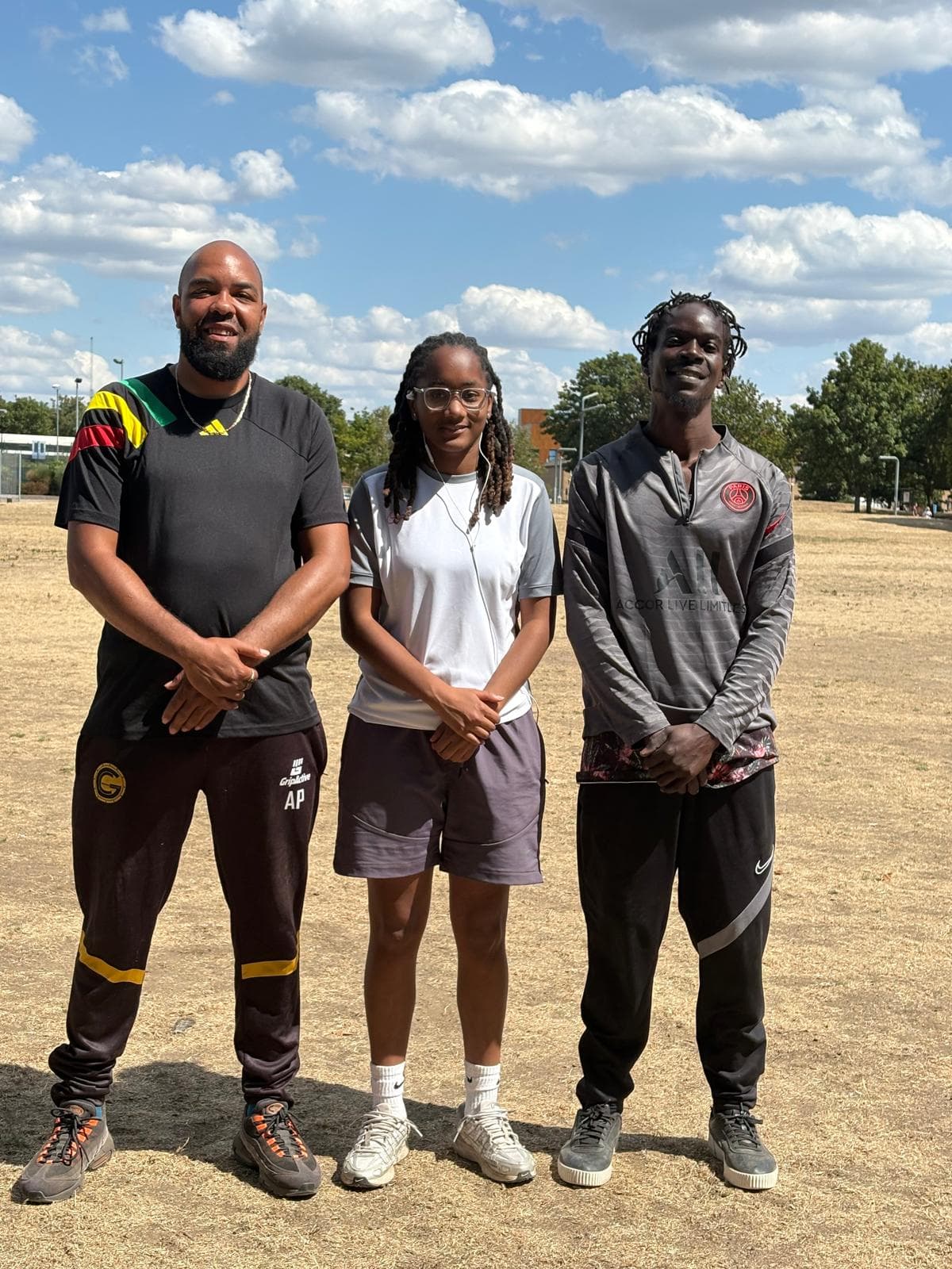 Academic Football coaching team together on the training field